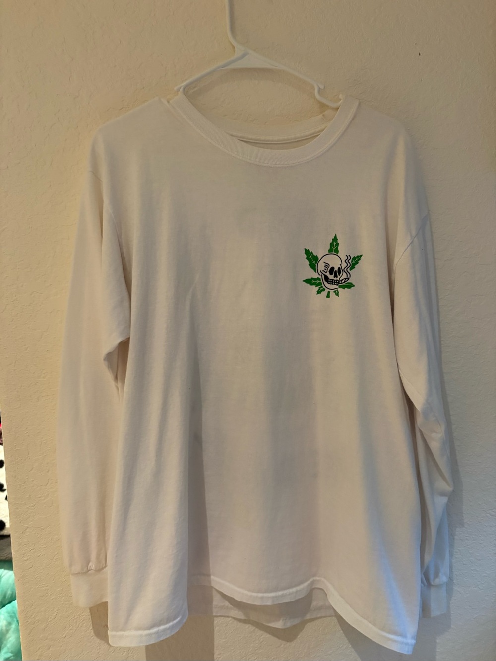 White Long Sleeve Tee with Green Leaf Skull Graphic